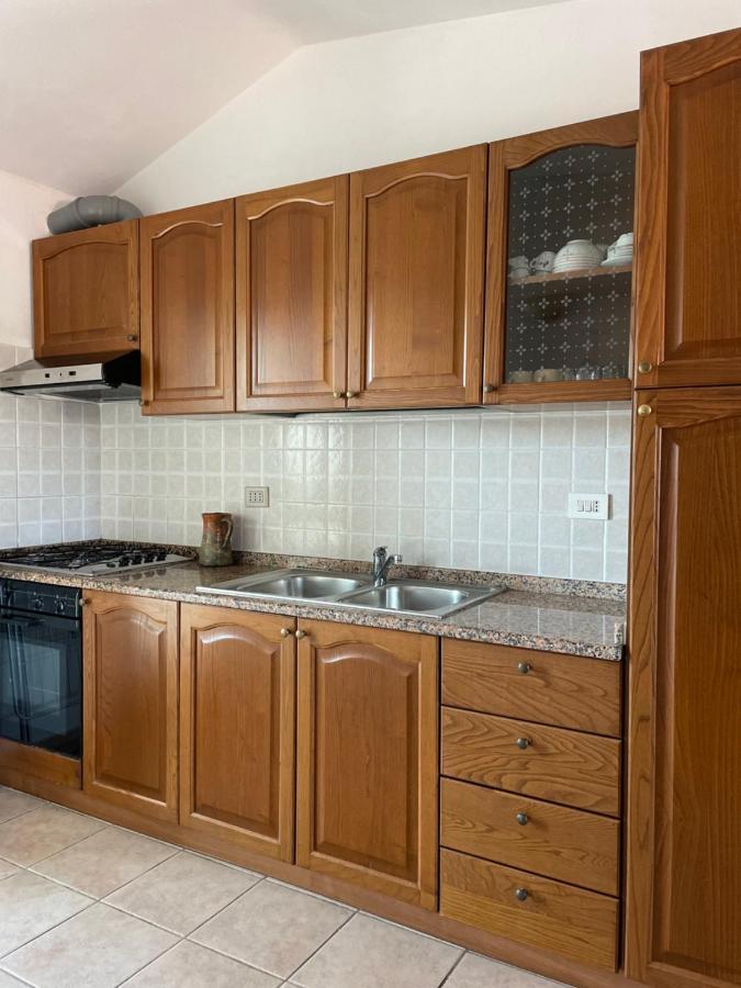 Apartamento La Casa Di Tonia La Caletta Exterior foto